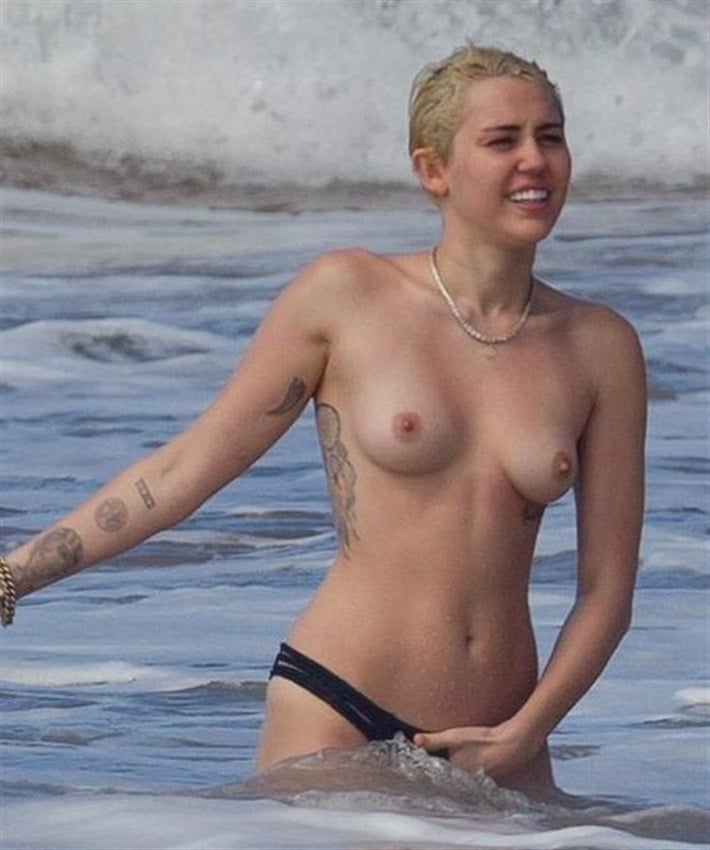 Crato Notícias De topless Miley Cyrus curte praia Patrick Schwarzenegger