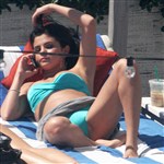 Selena Gomez Spreads Her Legs In A Bikini