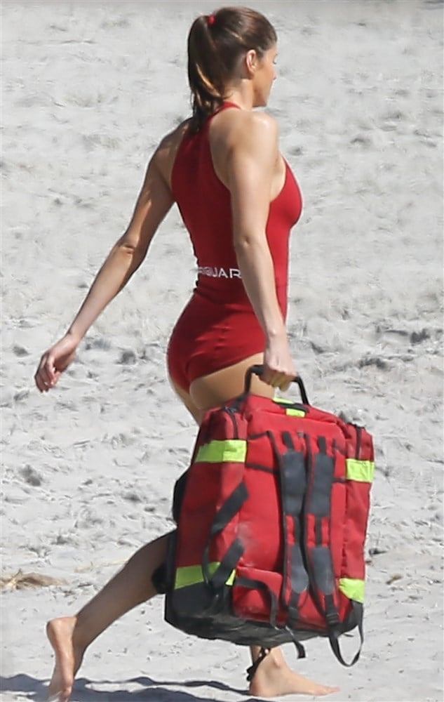 Alexandra Daddario Unveils The New “Baywatch” Red Swimsuit