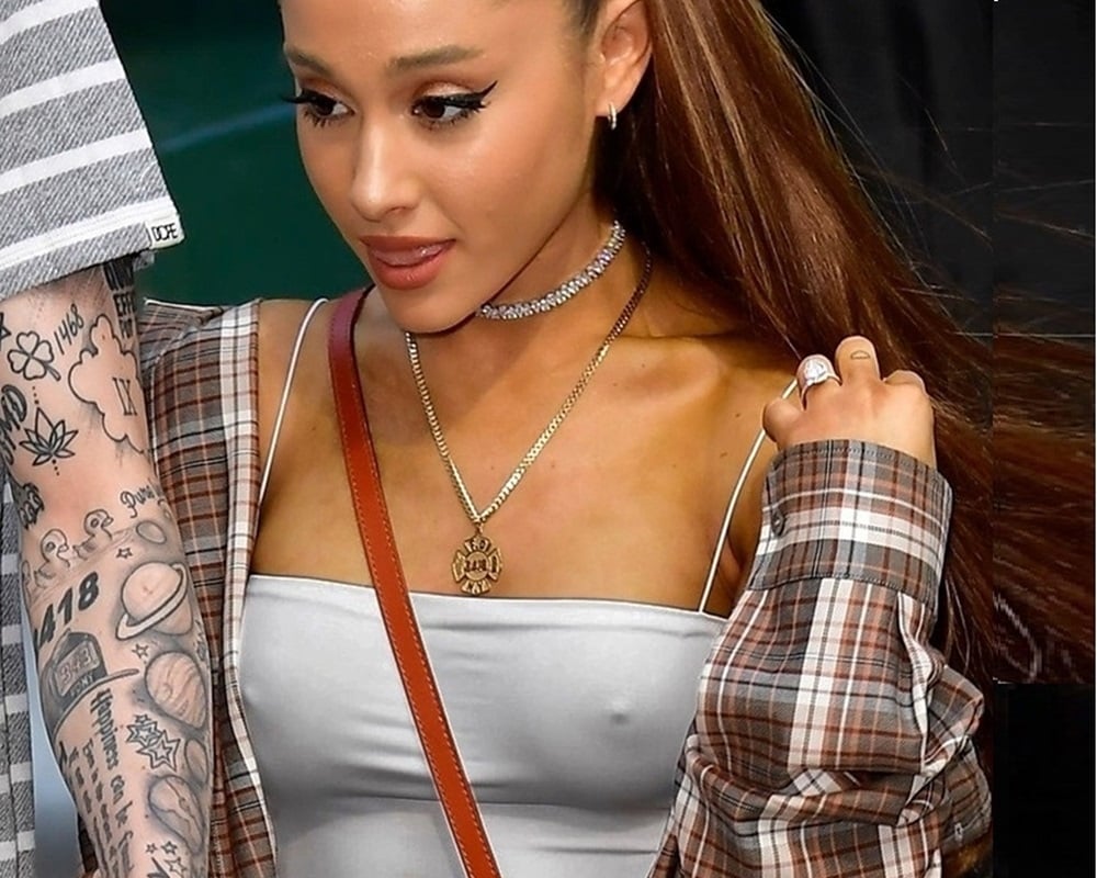 Ariana Grande Takes Out Her Hard Nipple Pokies