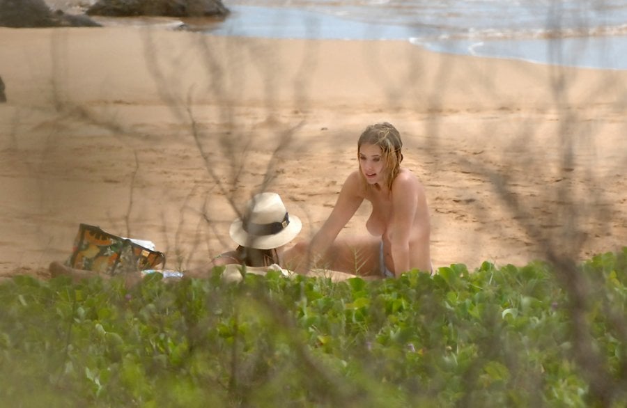 Ashley Benson was caught sunbathing completely topless while on a beach in ...