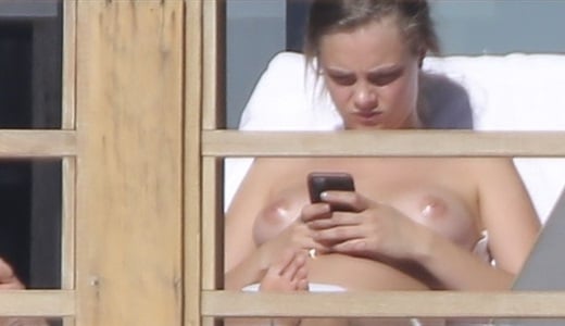 Cara Delevingne Sunbathing Topless At Kendall Jenners House