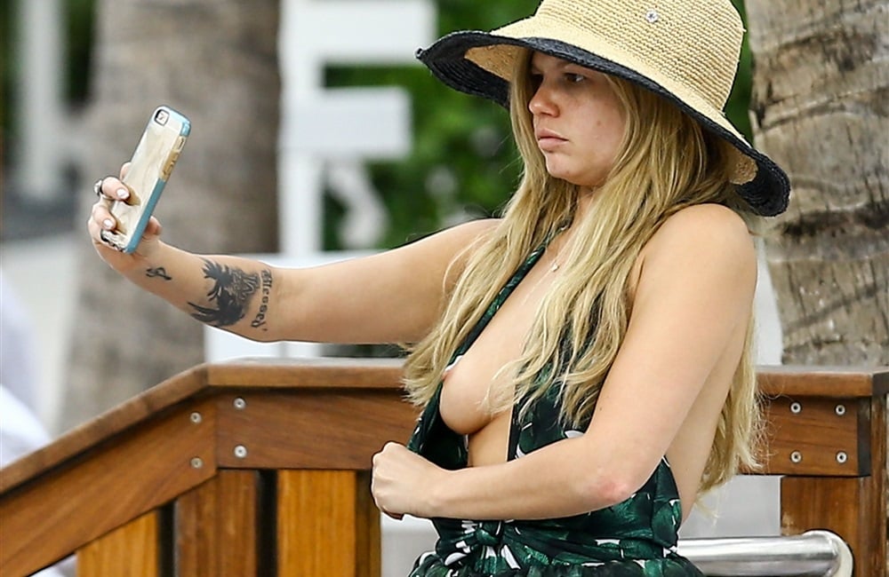 Chanel West Coast Takes Her Breast Out For A Selfie.