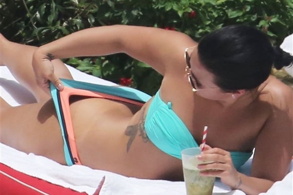 Demi Lovato Tanning Her Fat Ass In A Bikini