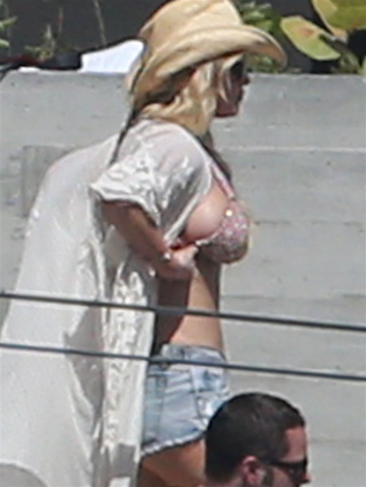 Jessica Simpson Stuffs Her Massive Boobs Into Tiny Bikini Top