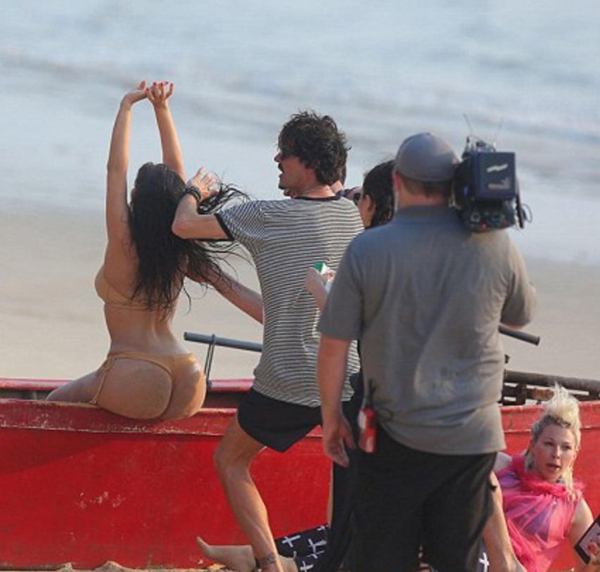 Behind The Scenes Of Kim Kardashian’s Thong Bikini Photo Shoot