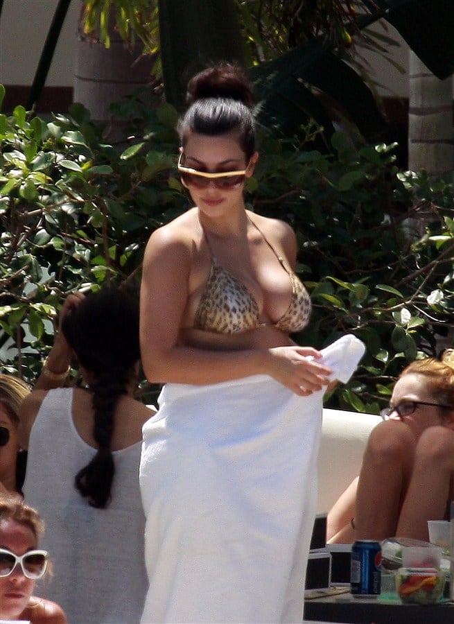 Kim Kardashian Flashes Boobs And Butt In A Bikini
