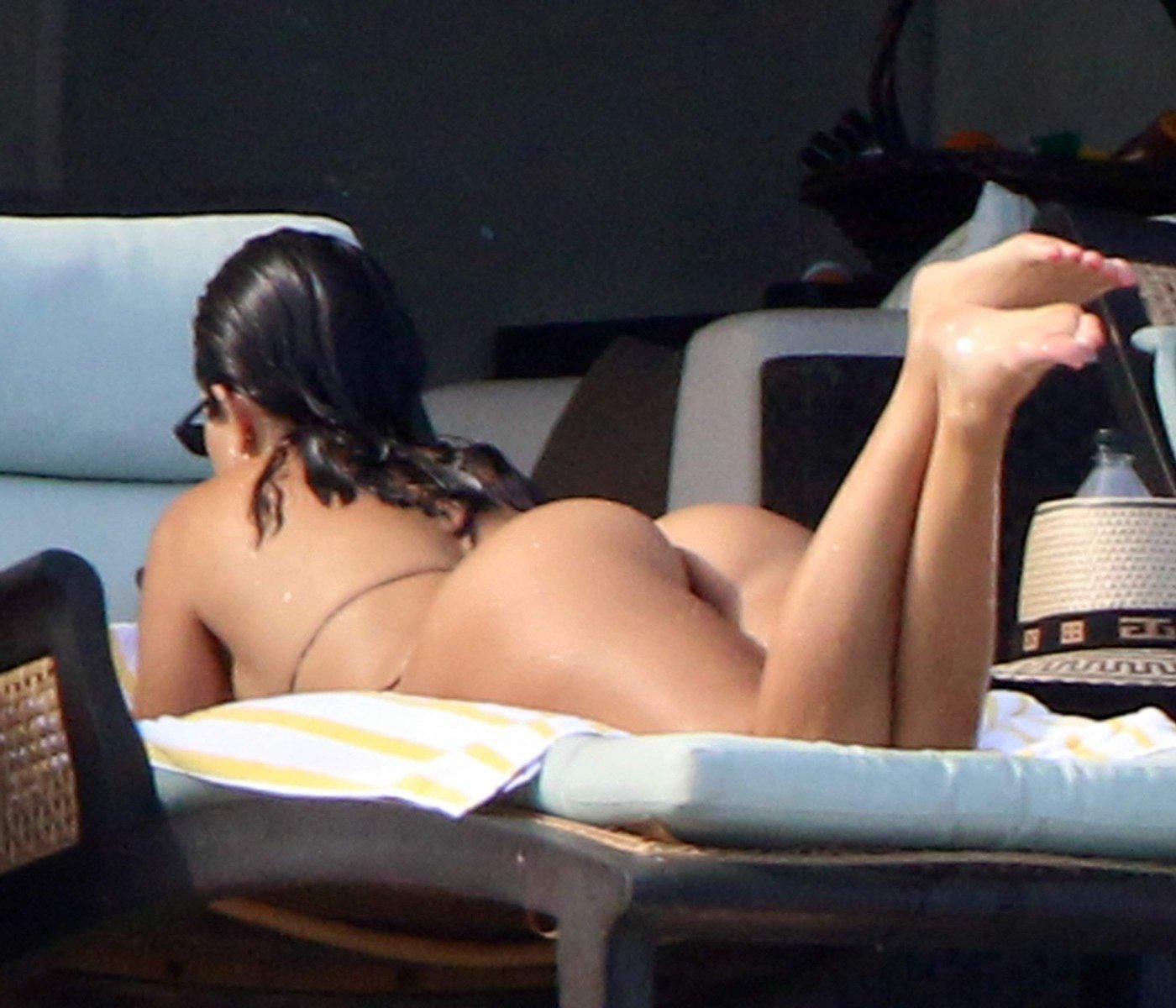Kourtney Kardashian Flaunts Her Ass In A Tiny Thong Bikini
