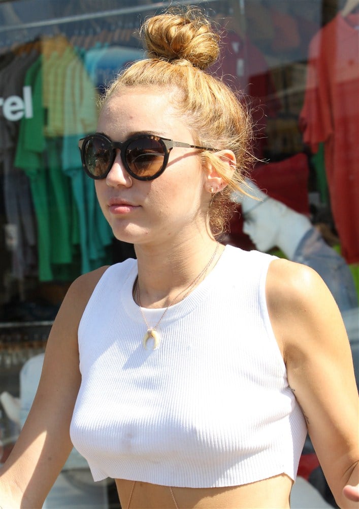 Miley Cyrus Shows Her Butt In Cut Off Shorts