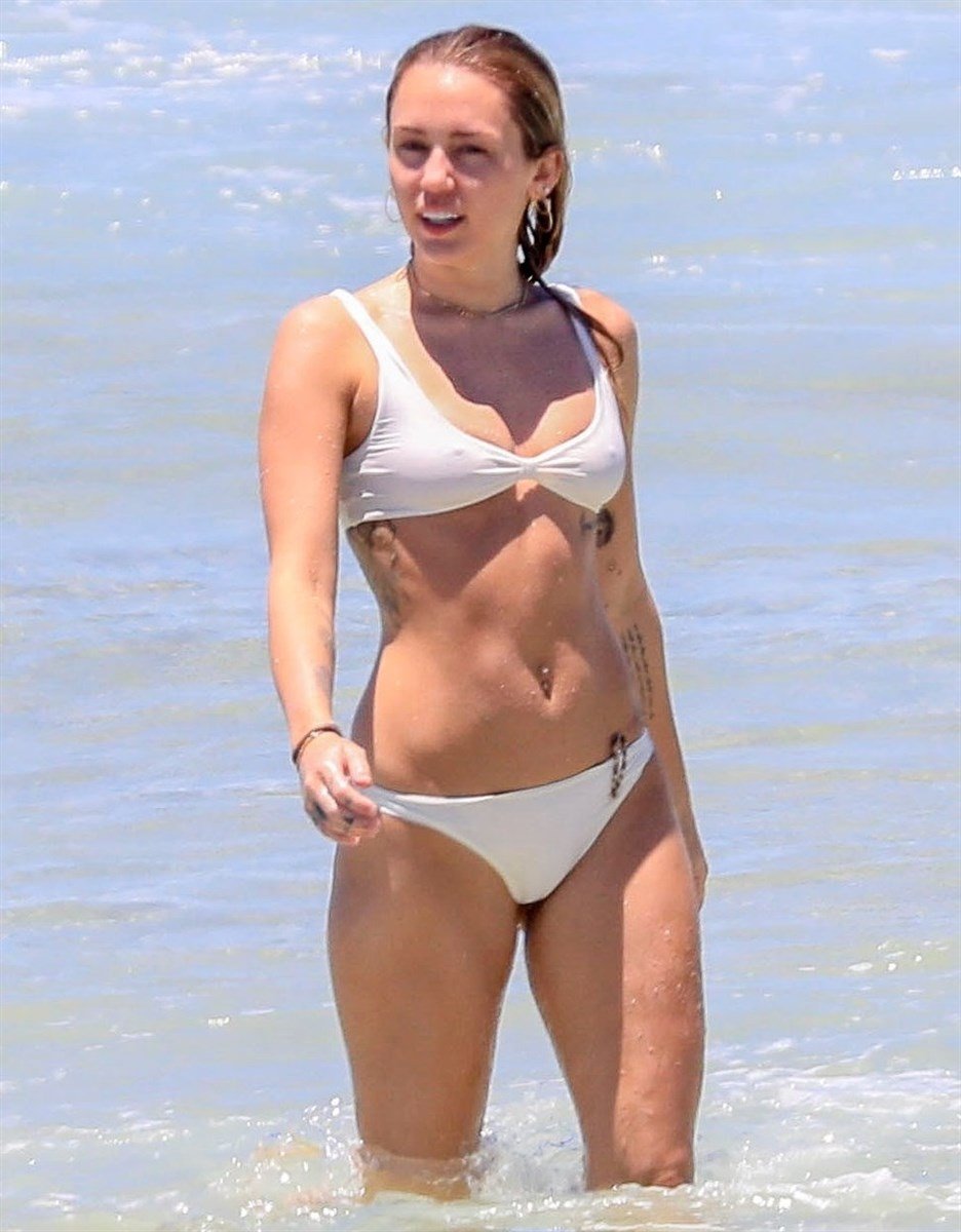 Miley Cyrus’ Fat Ass In A Thong Bikini At The Beach