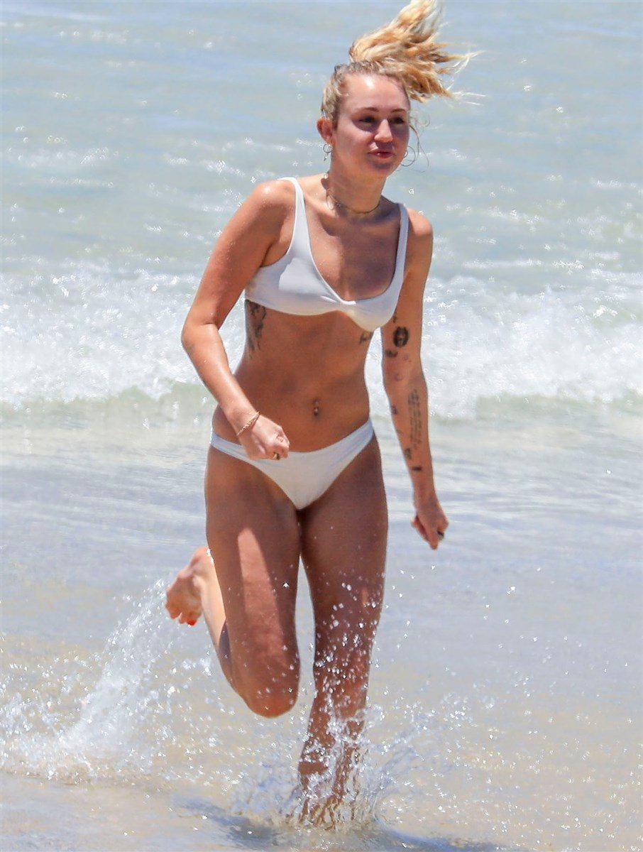 Miley Cyrus’ Fat Ass In A Thong Bikini At The Beach