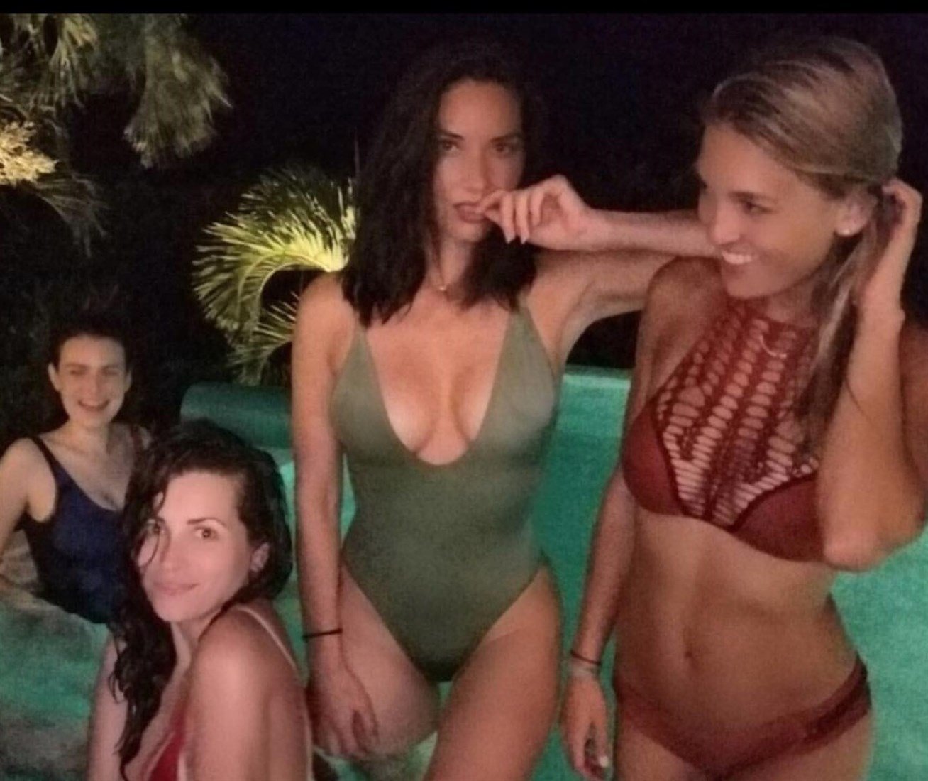 Olivia Munn In A Swimsuit Using Her Hot Friends