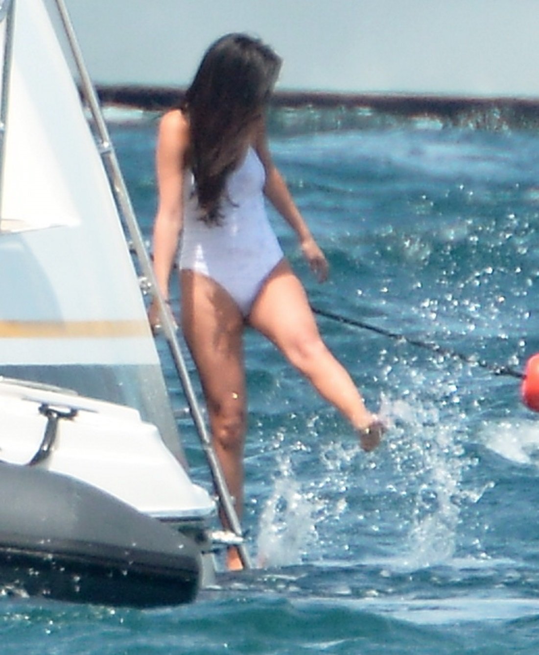 Selena Gomez On A Yacht In A Wet White Swimsuit