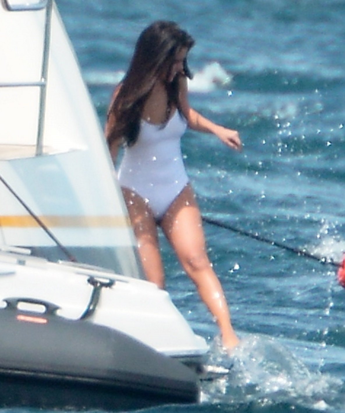 Selena Gomez On A Yacht In A Wet White Swimsuit