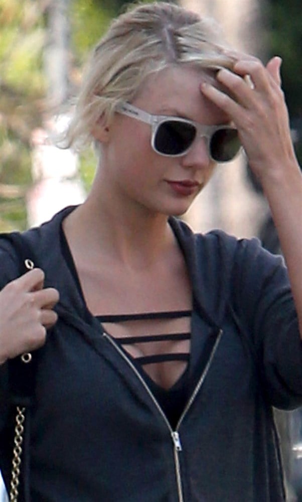 Taylor Swift Leaving Her Plastic Surgeon’s Office After A Boob Job