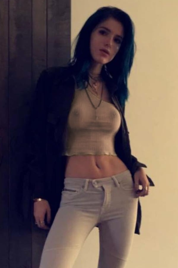 Bella Thorne Shows Off Her Pierced Nipple In A Topless Se