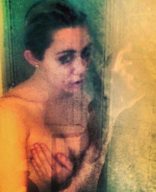 Miley Cyrus topless shower