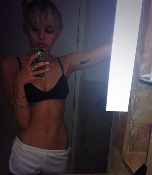 Miley Cyrus In A Bra Showing Off Her Abs