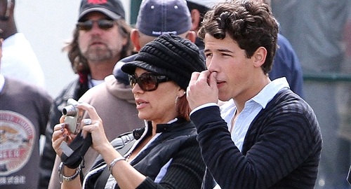 Nick Jonas Picks Nose