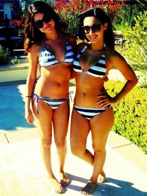 Selena Gomez Wearing A Striped Bikini