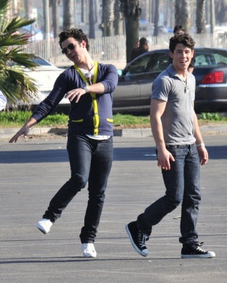 The Jonas Brothers Play Football