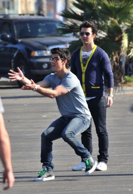 The Jonas Brothers Play Football
