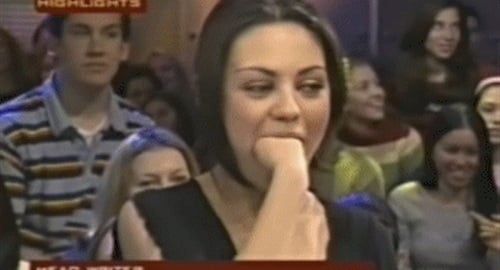 Mila Kunis fist