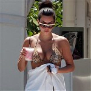 Kim Kardashian Flashes Boobs And Butt In A Bikini