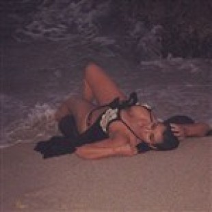 Kim Kardashian Beached, Clings To Life