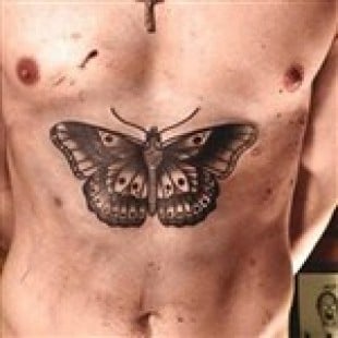 Harry Styles Gets A Huge Tattoo On His Stomach