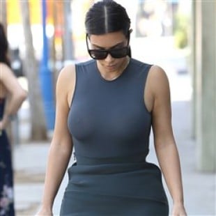 Kim Kardashian Walks The Streets In A Sheer Top With No Bra