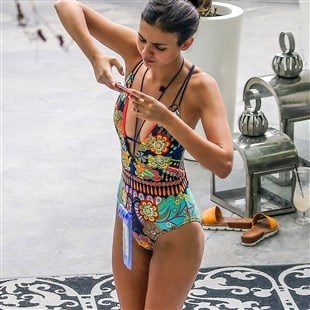 Victoria Justice Side Boob In A Low-Cut Swimsuit