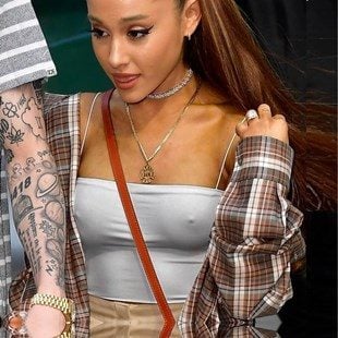 Ariana Grande Takes Out Her Hard Nipple Pokies