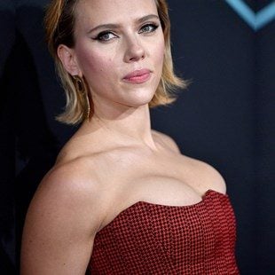 Scarlett Johansson With Her Boobs Pushed Up Fondling A Dildo